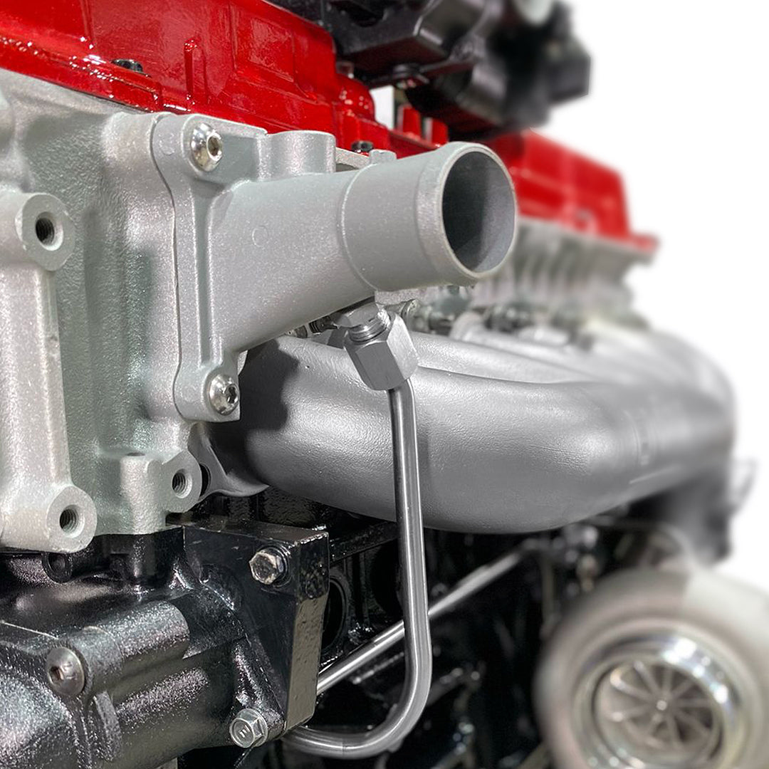 Water return hard line on TB48 engine using -6AN fitting 